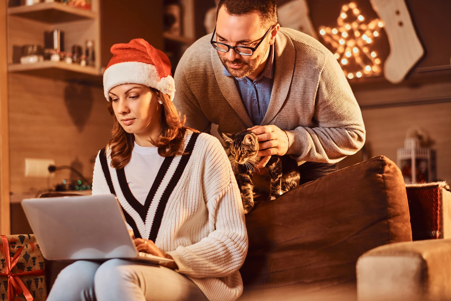 married couple using laptop